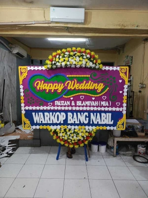 Papan Bunga di Benda Baru