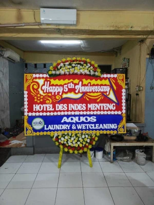 Papan Bunga di Benda Baru