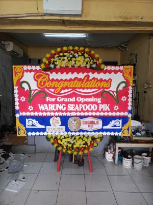 Papan Bunga di Benda Baru